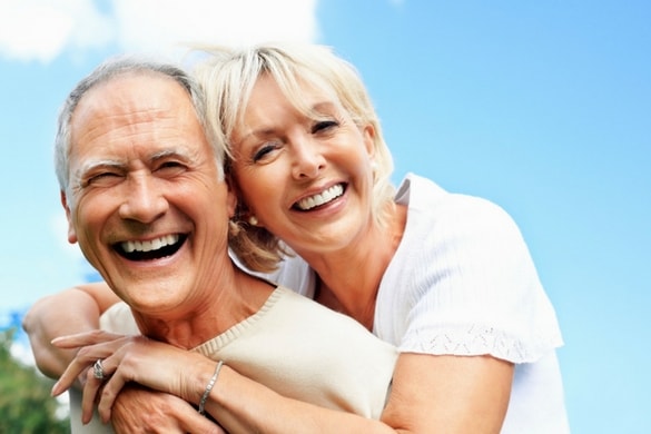 couple smiling with white teeth